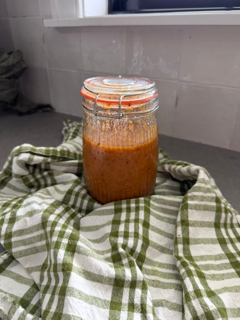 sun dried tomato vinaigrette in glass jar