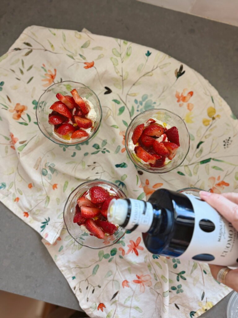 strawberry and cream dessert with olive oil in glasses