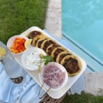 poolside hosting crispy smashed shawarma tacos