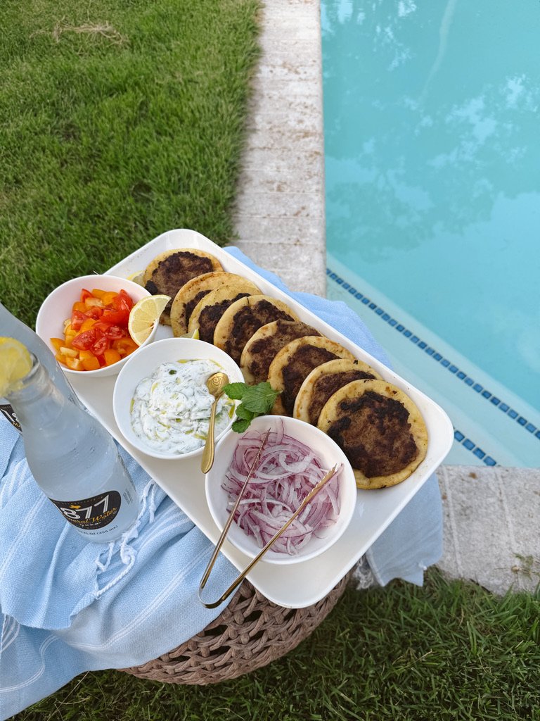 poolside hosting crispy smashed shawarma tacos
