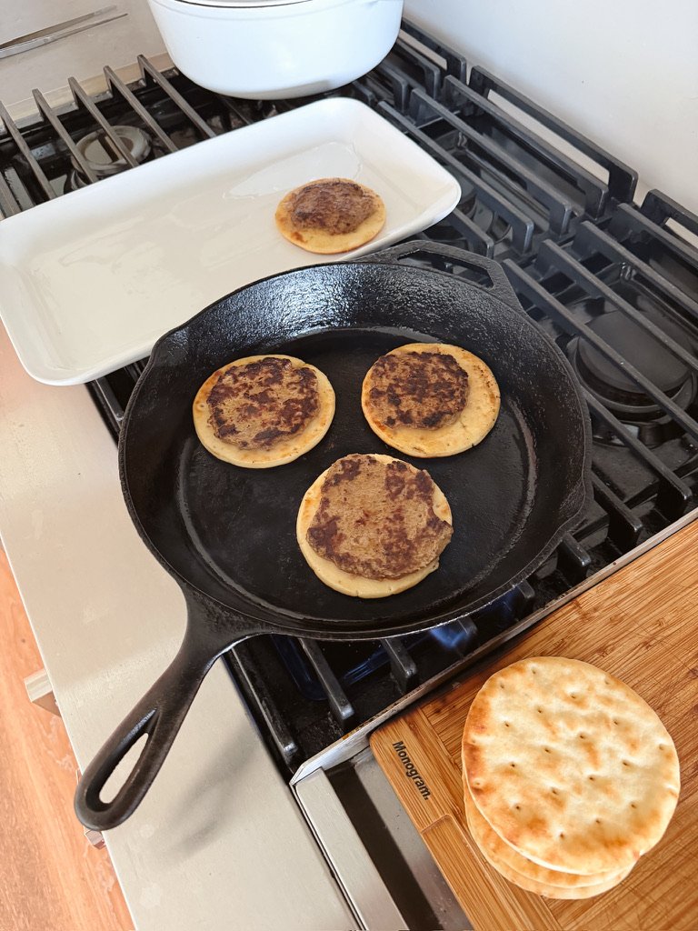 crispy smashed tacos in a skillet
