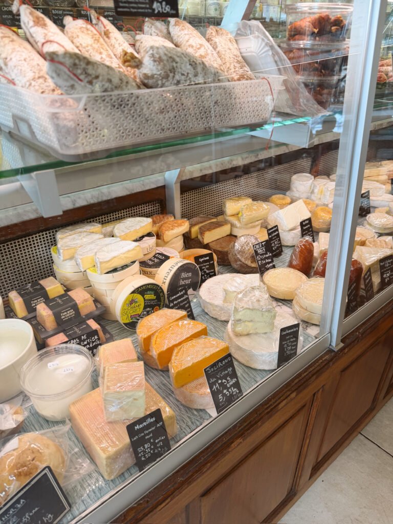 many cheese varieties in a Paris cheese shop