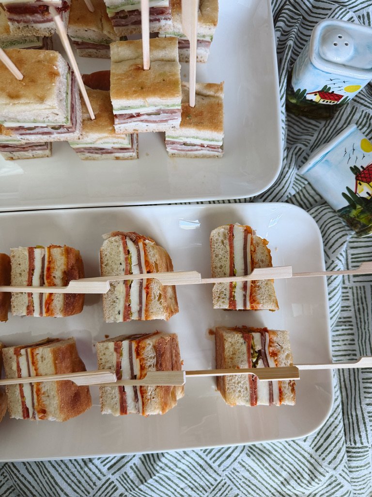 french pressed brick sandwich, layered antipasta sandwiches on tray, easy appetizer, school lunch