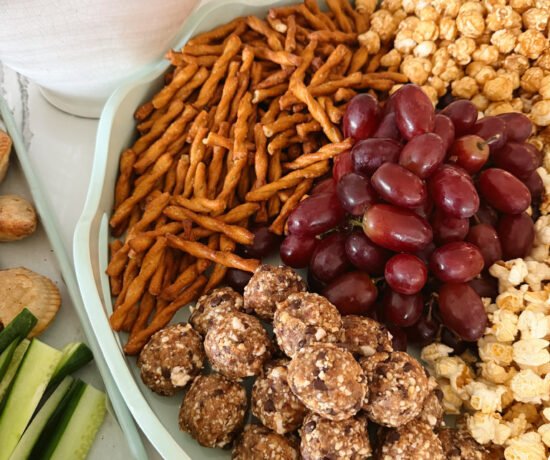 after school snack board, pretzels, popcorn, protein bites