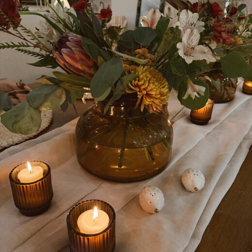moody fall table with flowers and candles