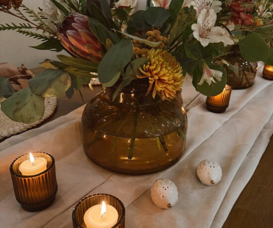 moody fall table with flowers and candles