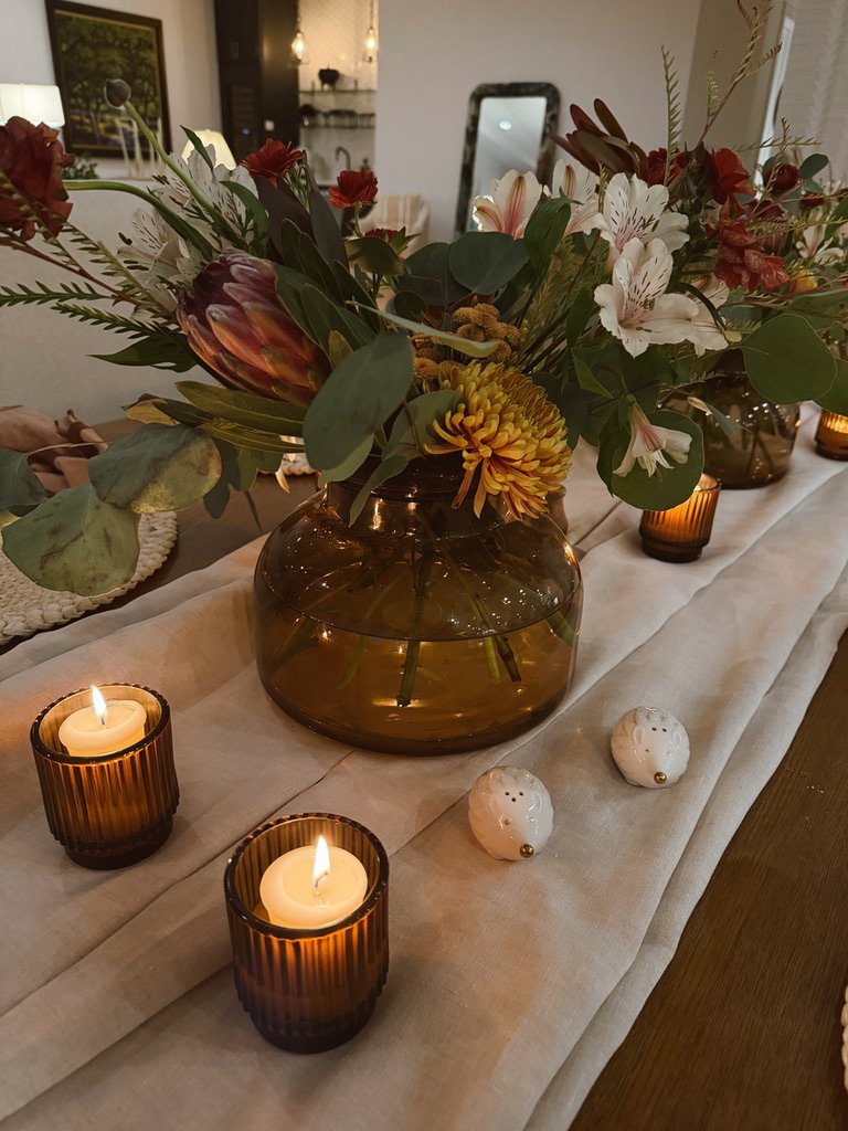 moody fall table with flowers and candles